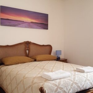 "alt="double bed holiday home lake iseo
